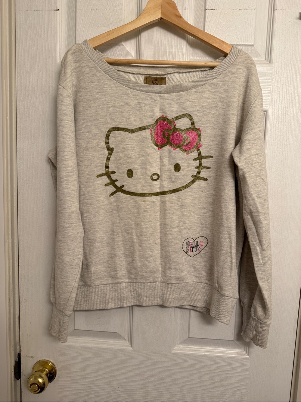 Hello Kitty Cream Graphic Sweatshirt with Pink Accent Bow
